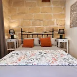 The Cloisters Couette-café Xagħra